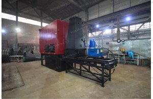 Котел 0.6 МВт на щепе и опилках отопительный с плунжерной подачей топлива